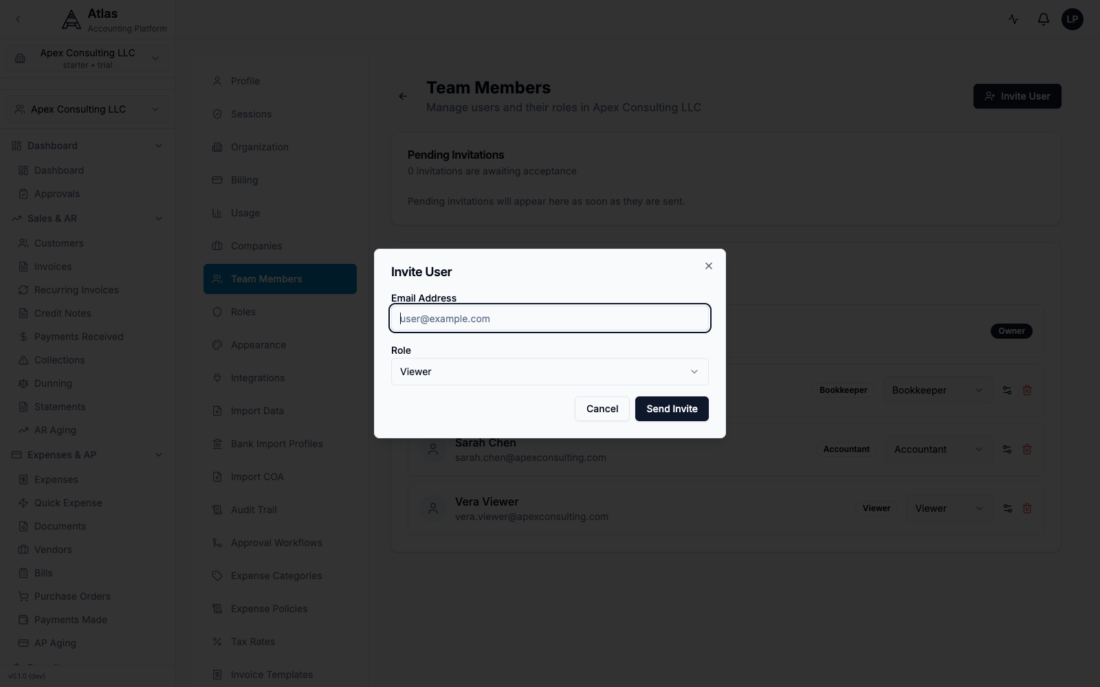 The Invite User dialog over the Team Members list, with an Email Address field and a Role selector, plus the existing members and their role badges.